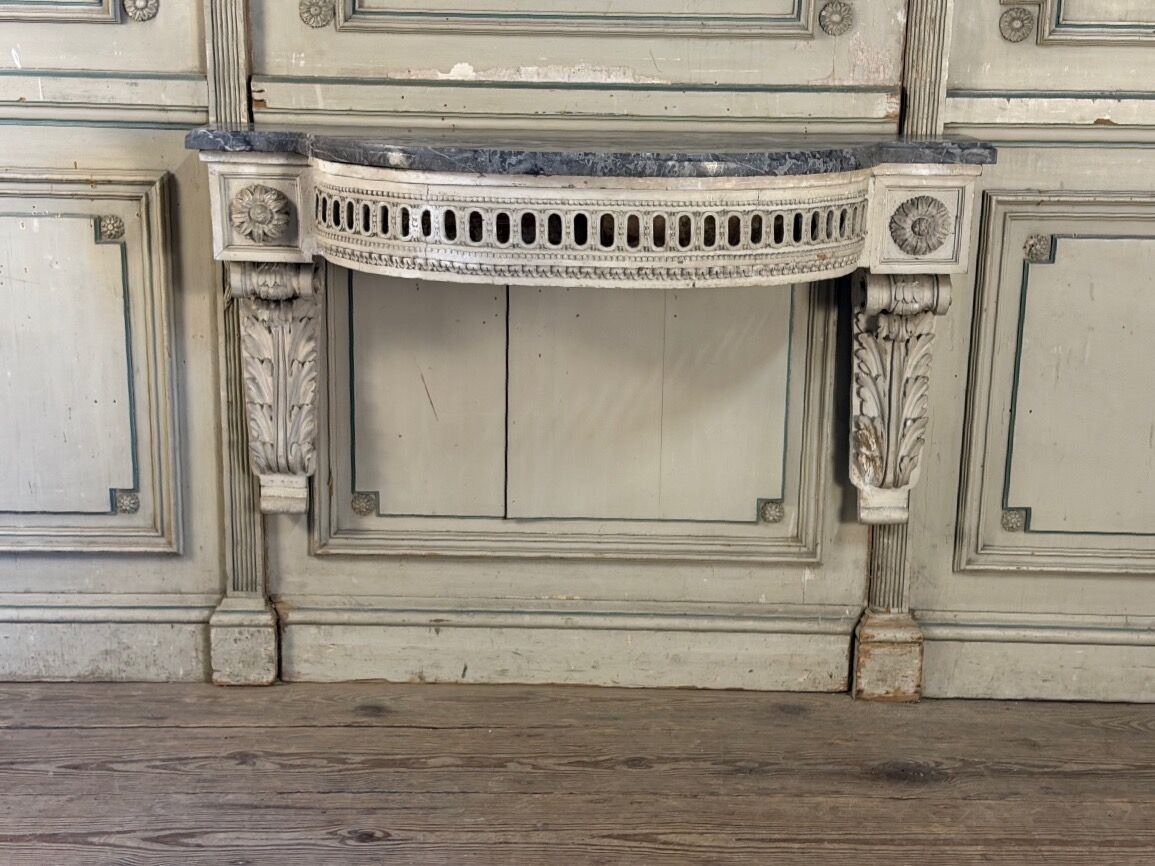 Louis XVI wall console in carved wood, grey patina, 18th century.