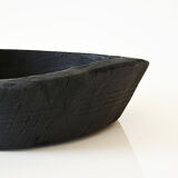 Cut / empty pocket in burning wood. shou-sugi-ban