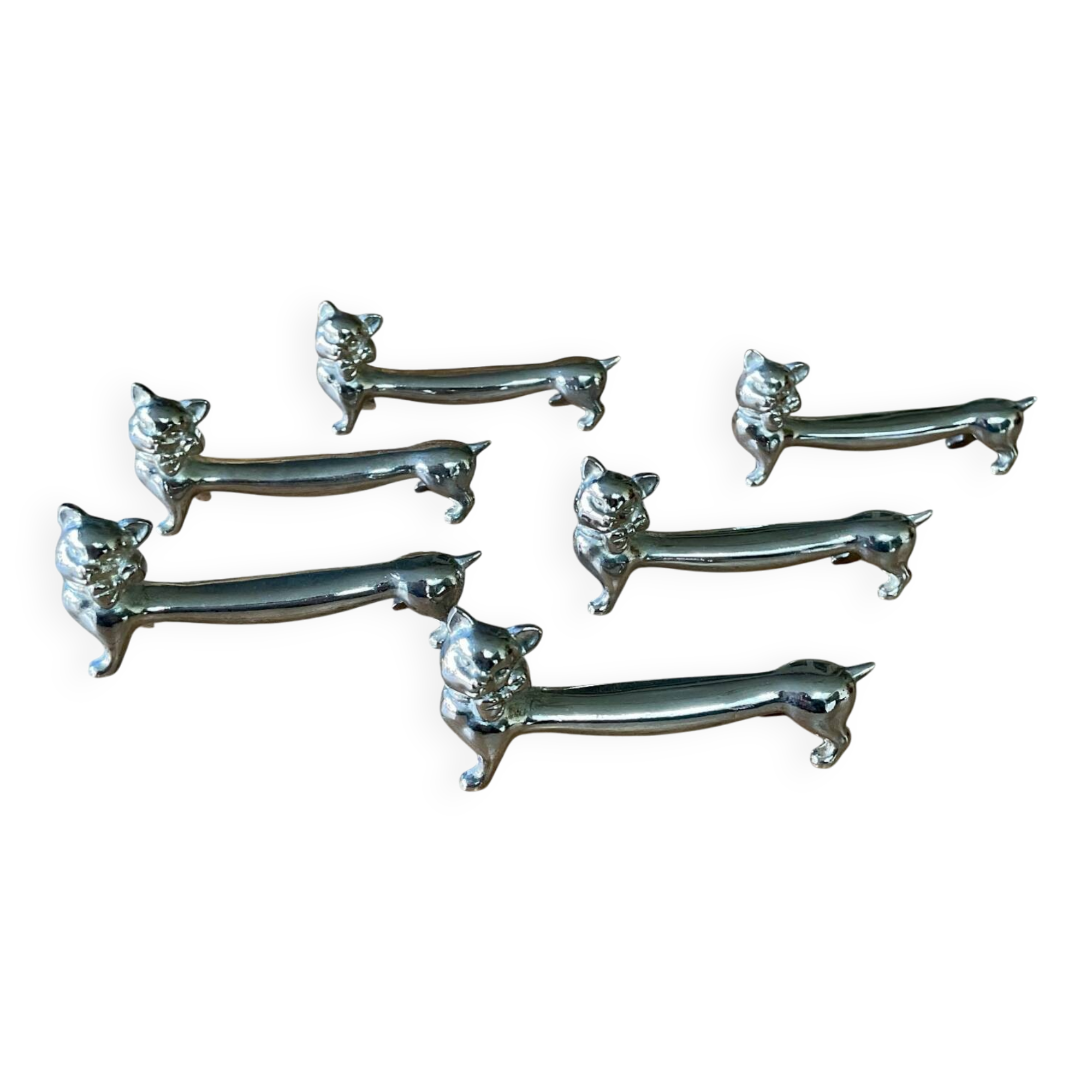 6 silver metal “cat” knife holders