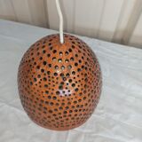 Openwork suspension in wood