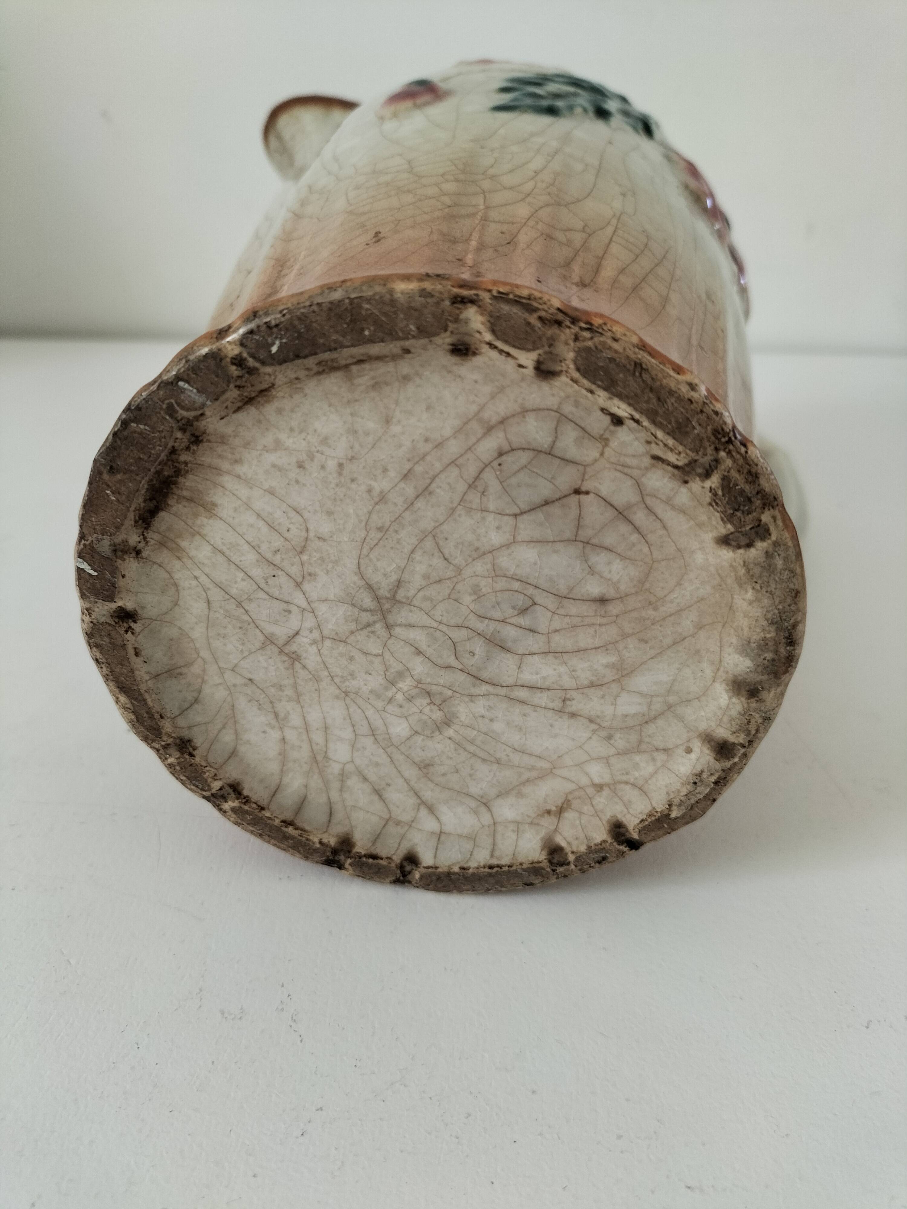 Moulded slip pitcher - late 19th century - Floral decoration in relief