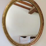 Golden oval mirror 41/35 cm