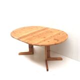 Vintage extendable pine dining table made in the 1970s