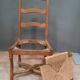 Serie de 4 chaises "os de mouton" à assises paillees