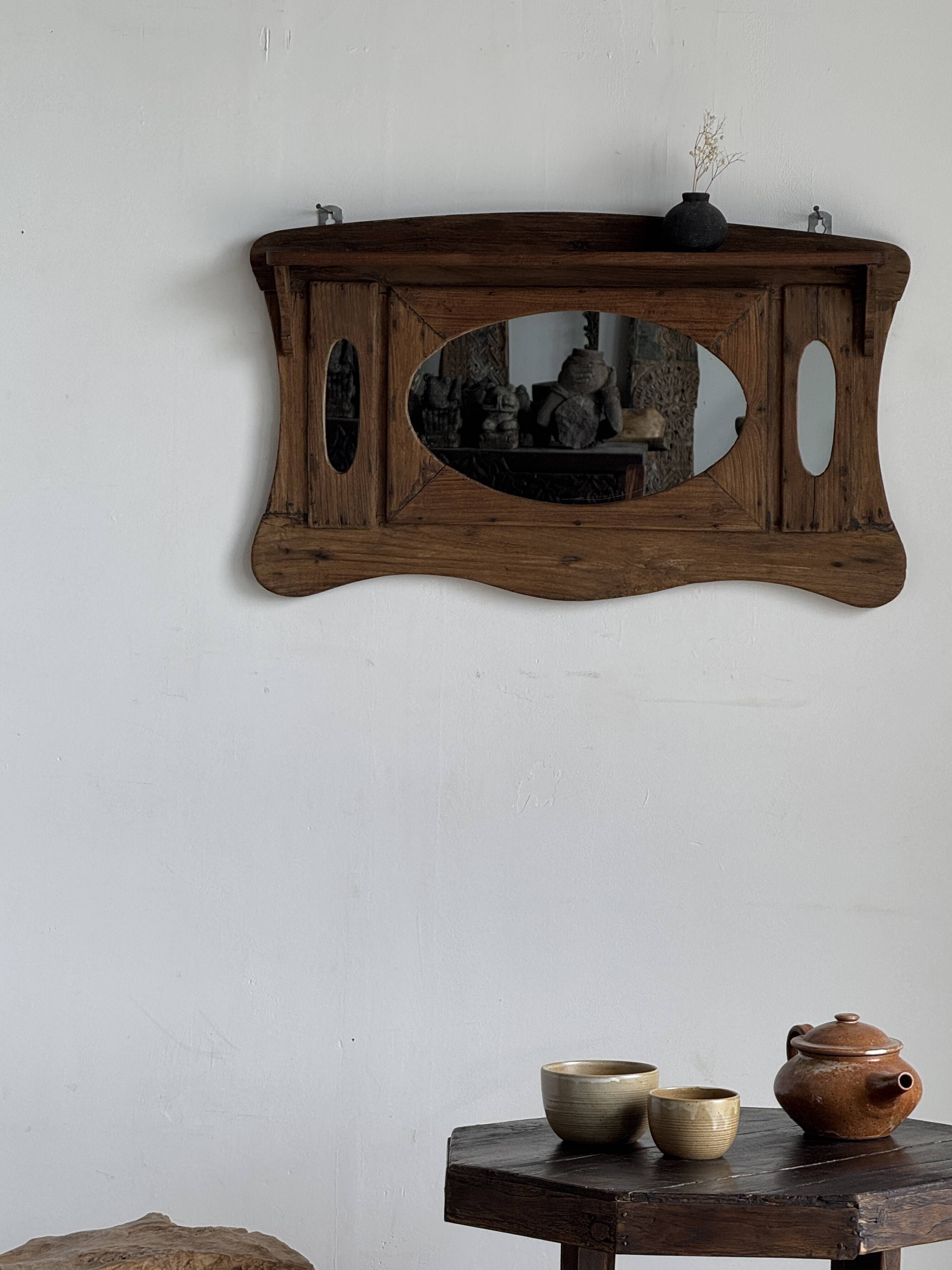 Small wall mirror in organic old Indonesian teak 75x45.