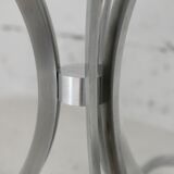 Living room table "Space Age" polished steel, circular slab smoked glass. France, circa 1970.