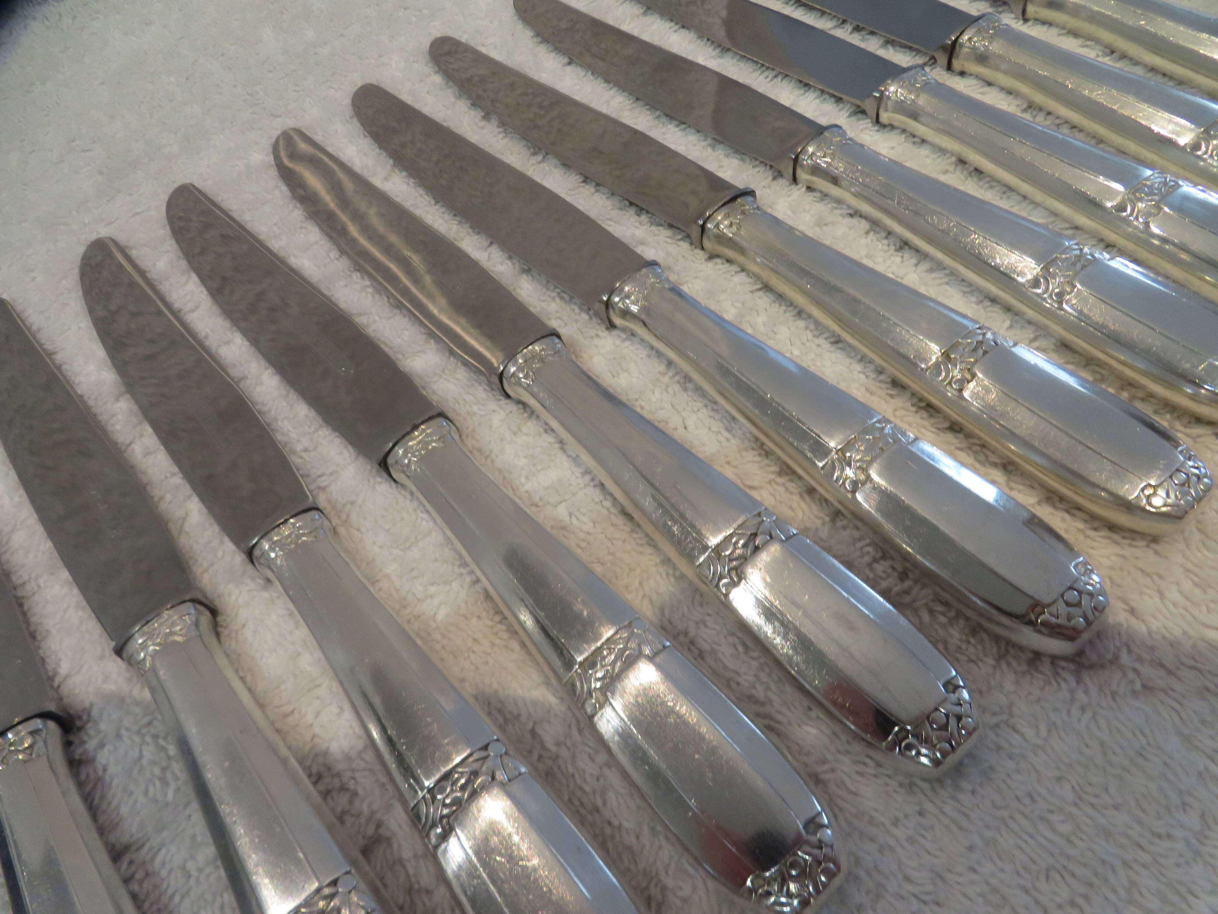 12 silver-plated dessert knives by Argit goldsmith? Art Deco floral bands