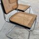 Pair of chairs by Marcel Breuer in black canework model B32 signed Italy