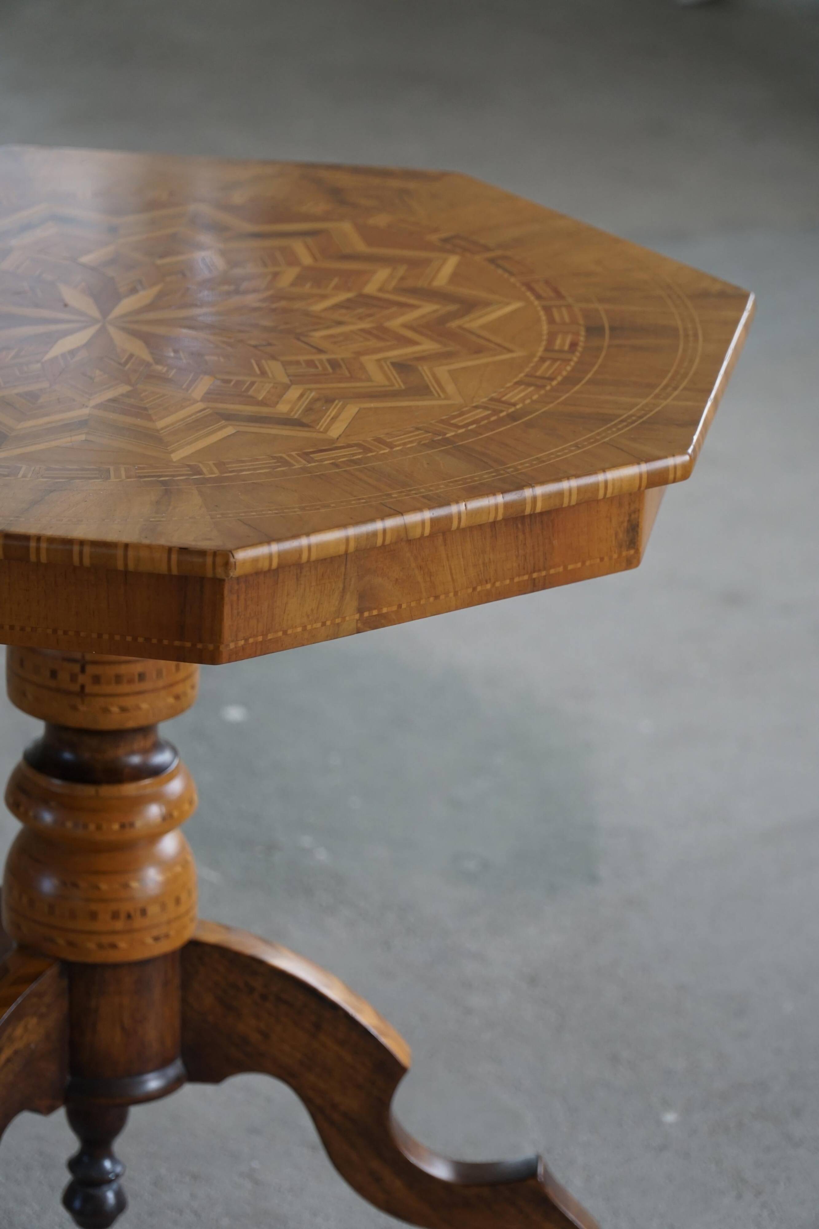 Danish Art Deco octagonal side table in birch with an inlaid top, 1940s.