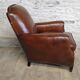 Studded club armchair
