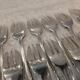 12 silver-plated metal cake forks by silversmith Guillaumot, contours