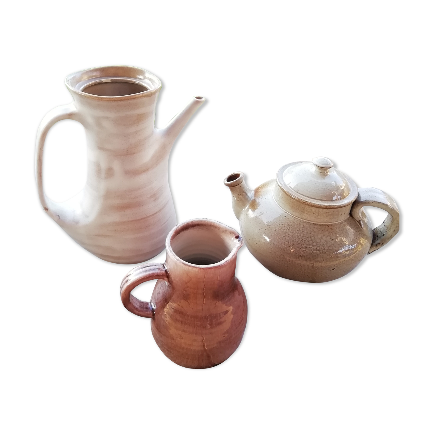 Trio of artisan sandstone teapots