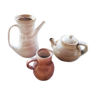 Trio of artisan sandstone teapots