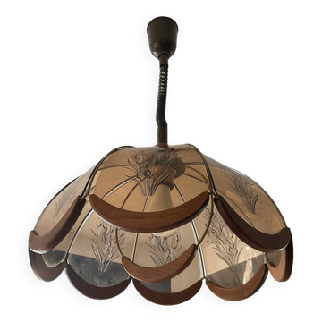 Scandinavian style glass and wood pendant light.