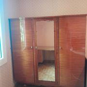 Large vintage wardrobe from the 50s/60s in wood with a mirror.