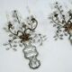 Paire de appliques en cristal et bronze Maison Bagues, années 1960.