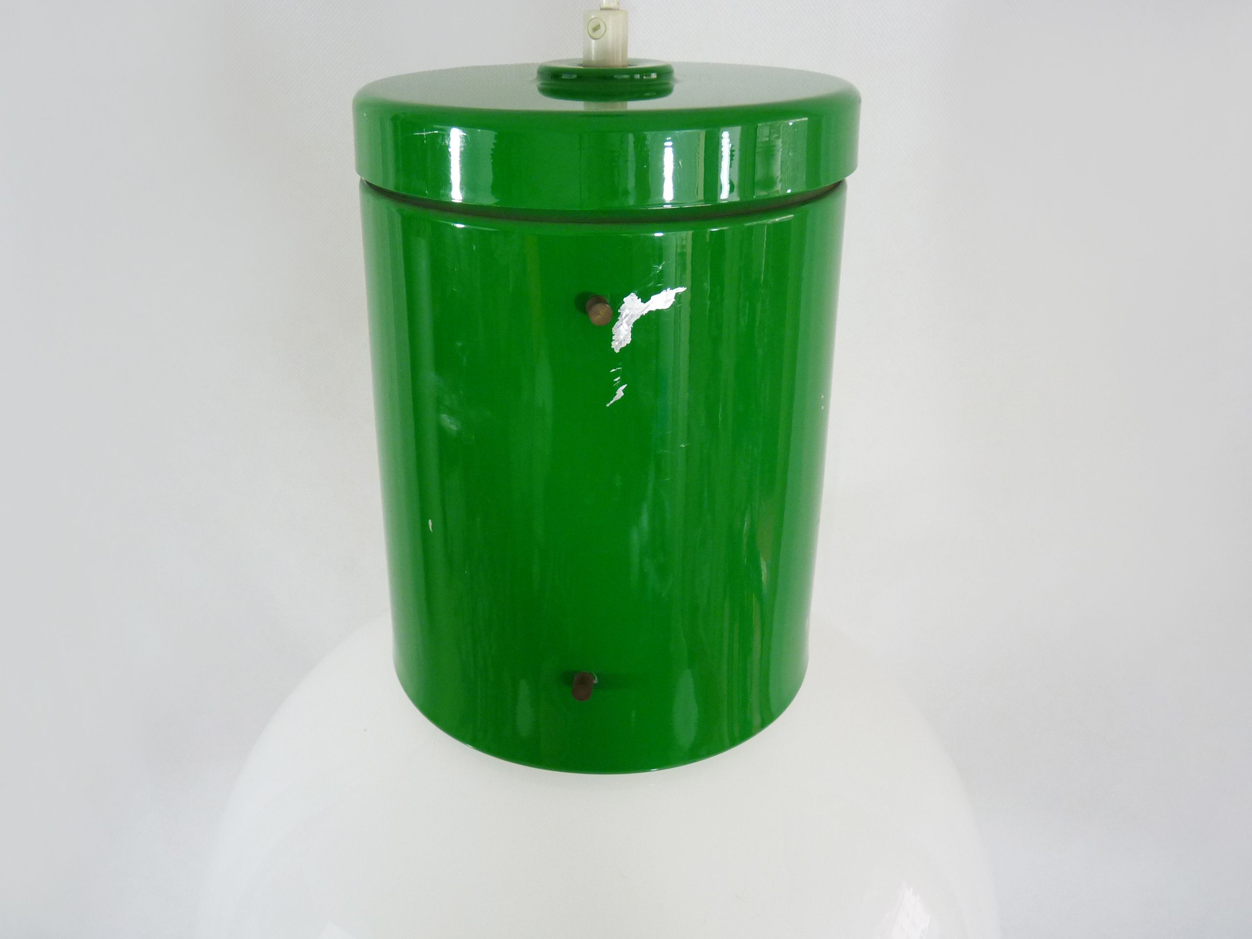 Vintage industrial suspension in green metal and white plastic lampshade. Year 70