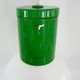 Vintage industrial suspension in green metal and white plastic lampshade. Year 70