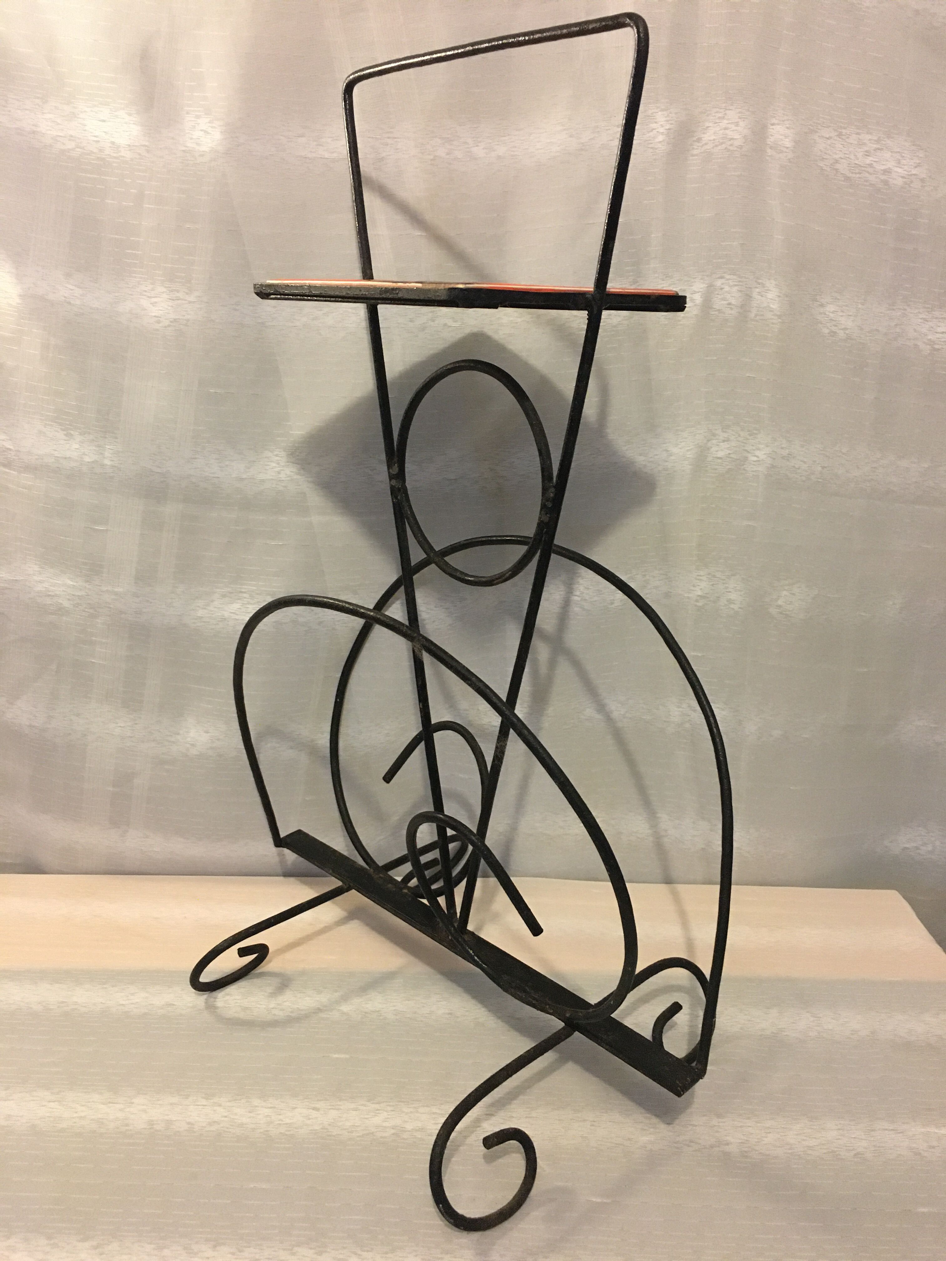 Wrought iron newspaper holder
