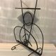 Wrought iron newspaper holder