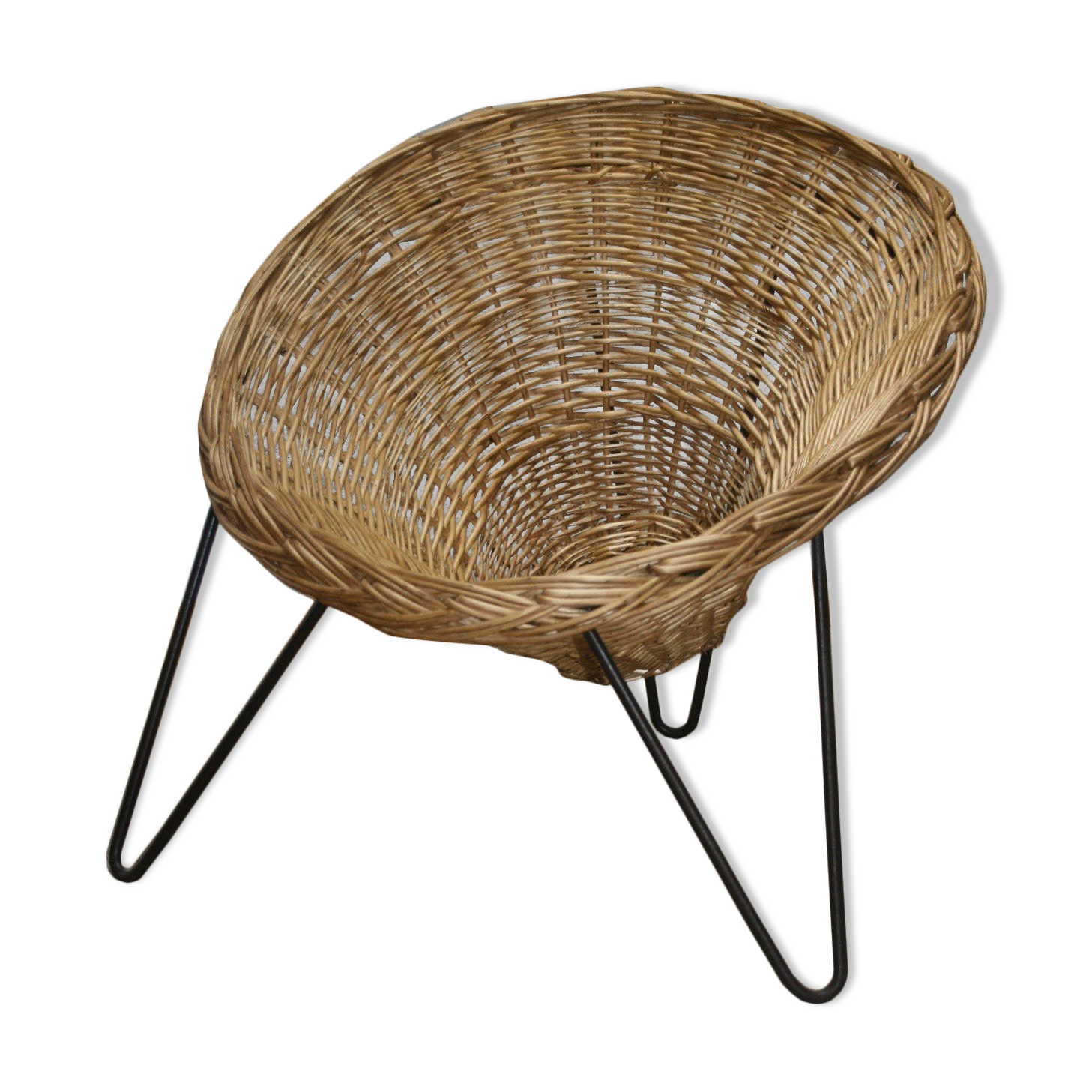 Wicker basket armchair in the 50s