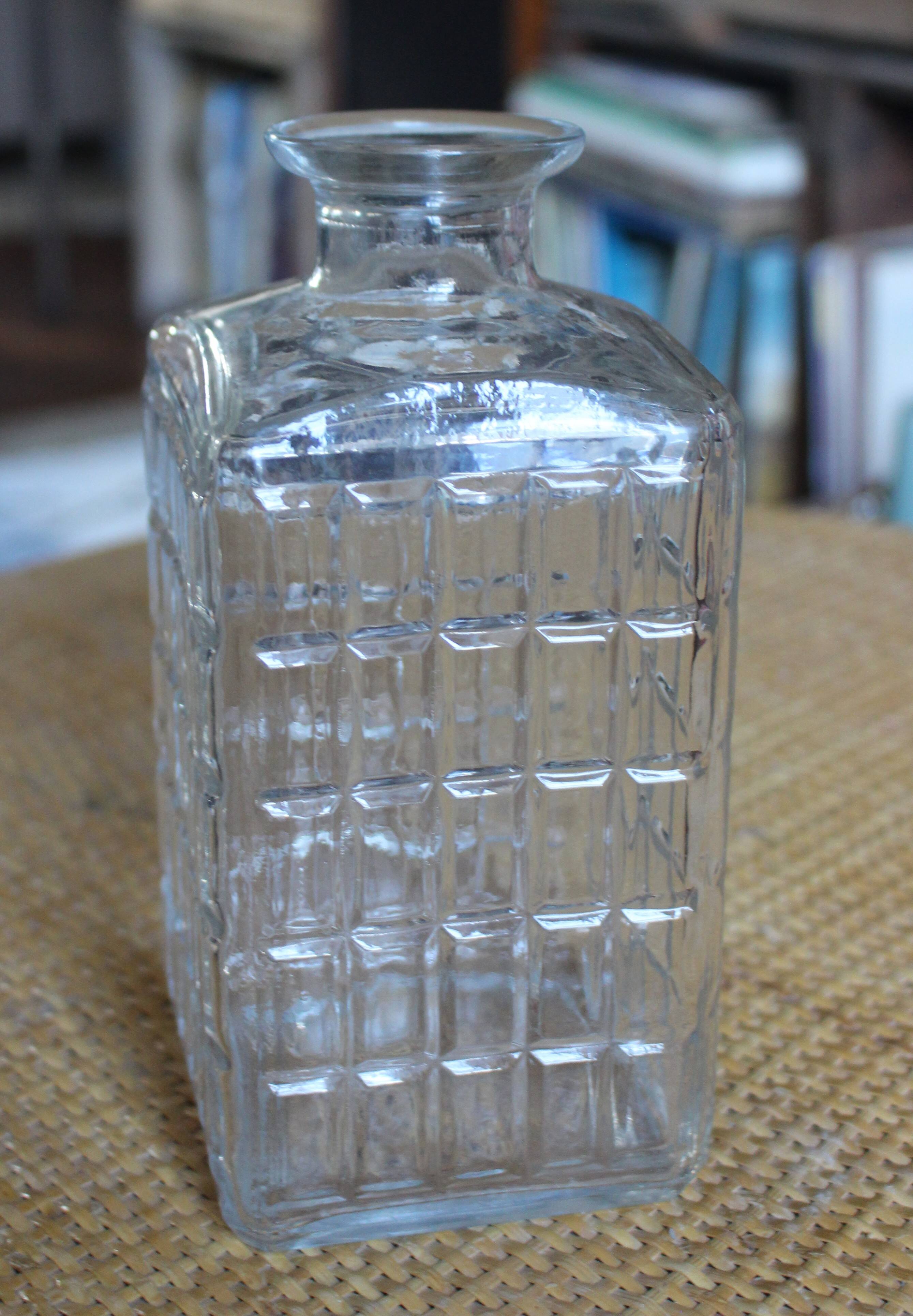 Vintage glass water carafe with rectangular vase.