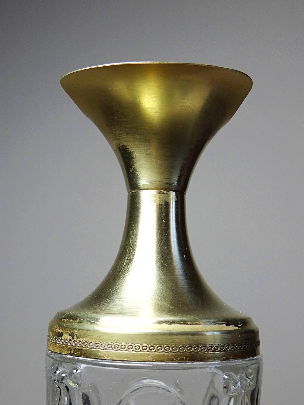 Vintage decorative jug in moulded glass and gilded brass, Italy circa 1980.