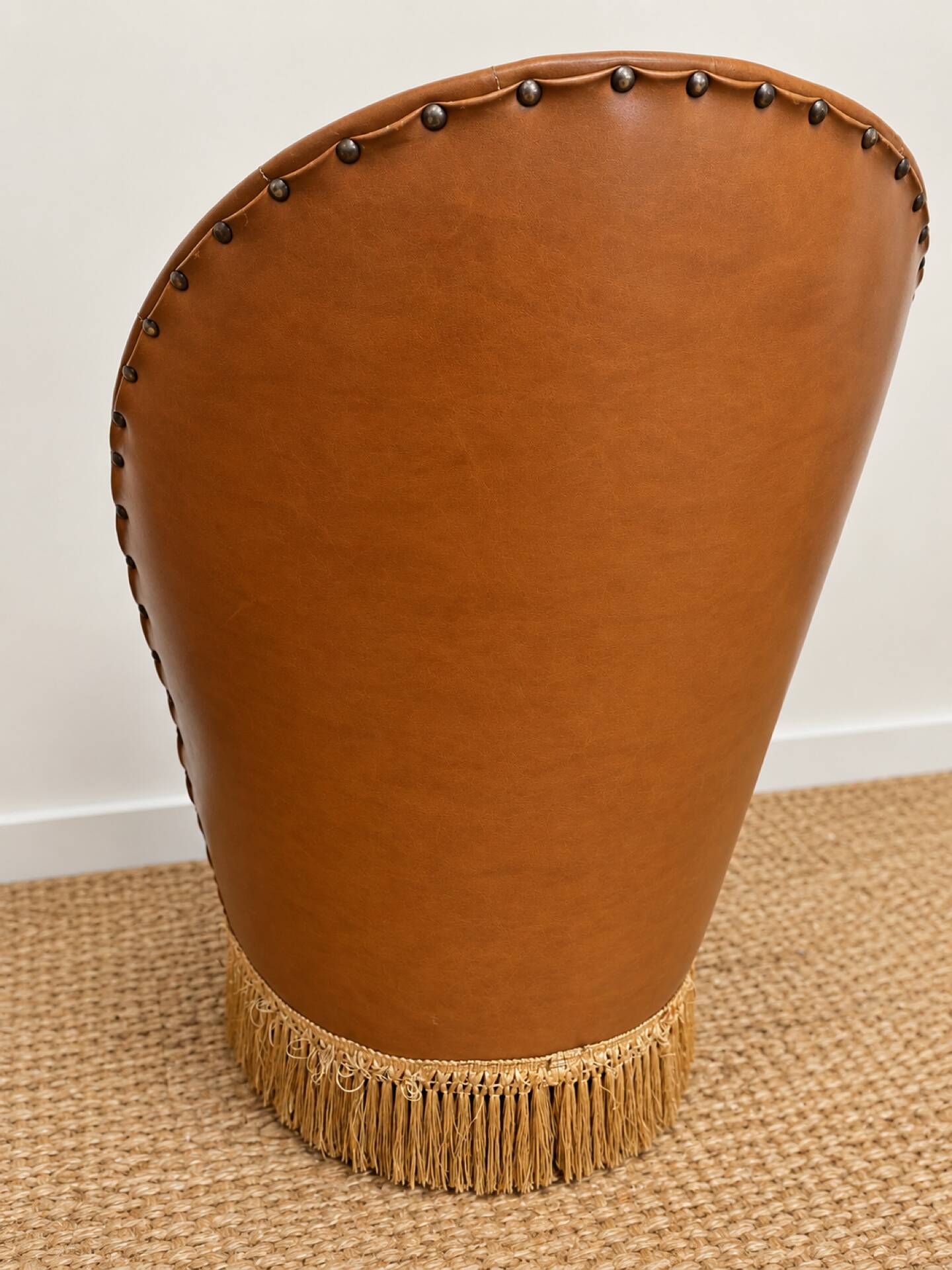 Vintage cognac fringe tub chairs
