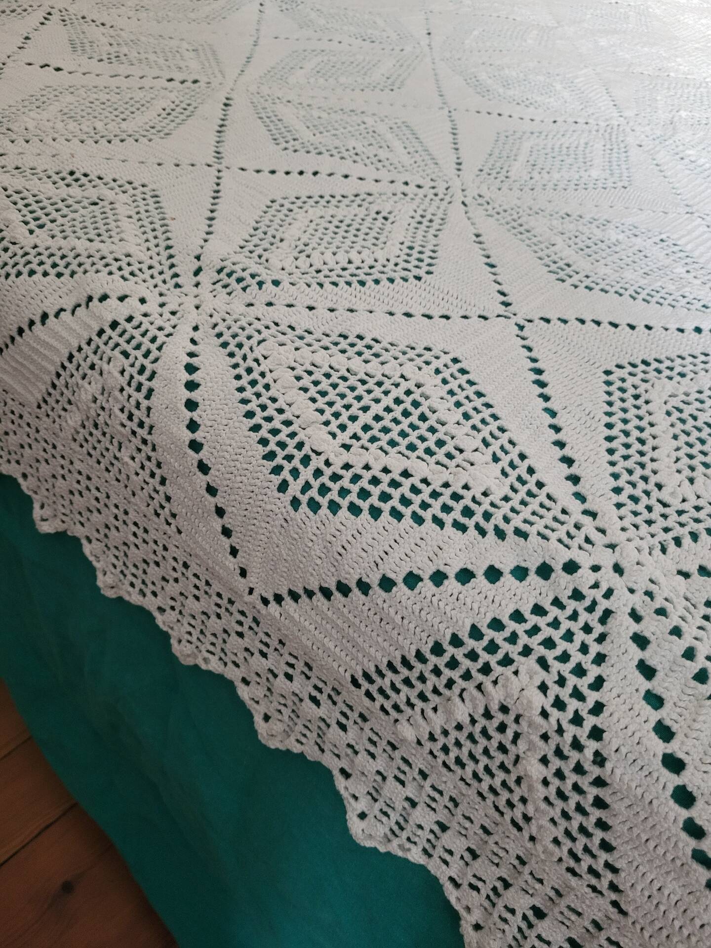 Large white crocheted bedspread