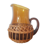 Brown glass decanter/pitcher with 70s wicker basket