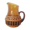 Brown glass decanter/pitcher with 70s wicker basket