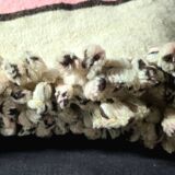 Vintage Berber blanket in neon pink, black and cream striped wool