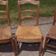17 old straw chairs
