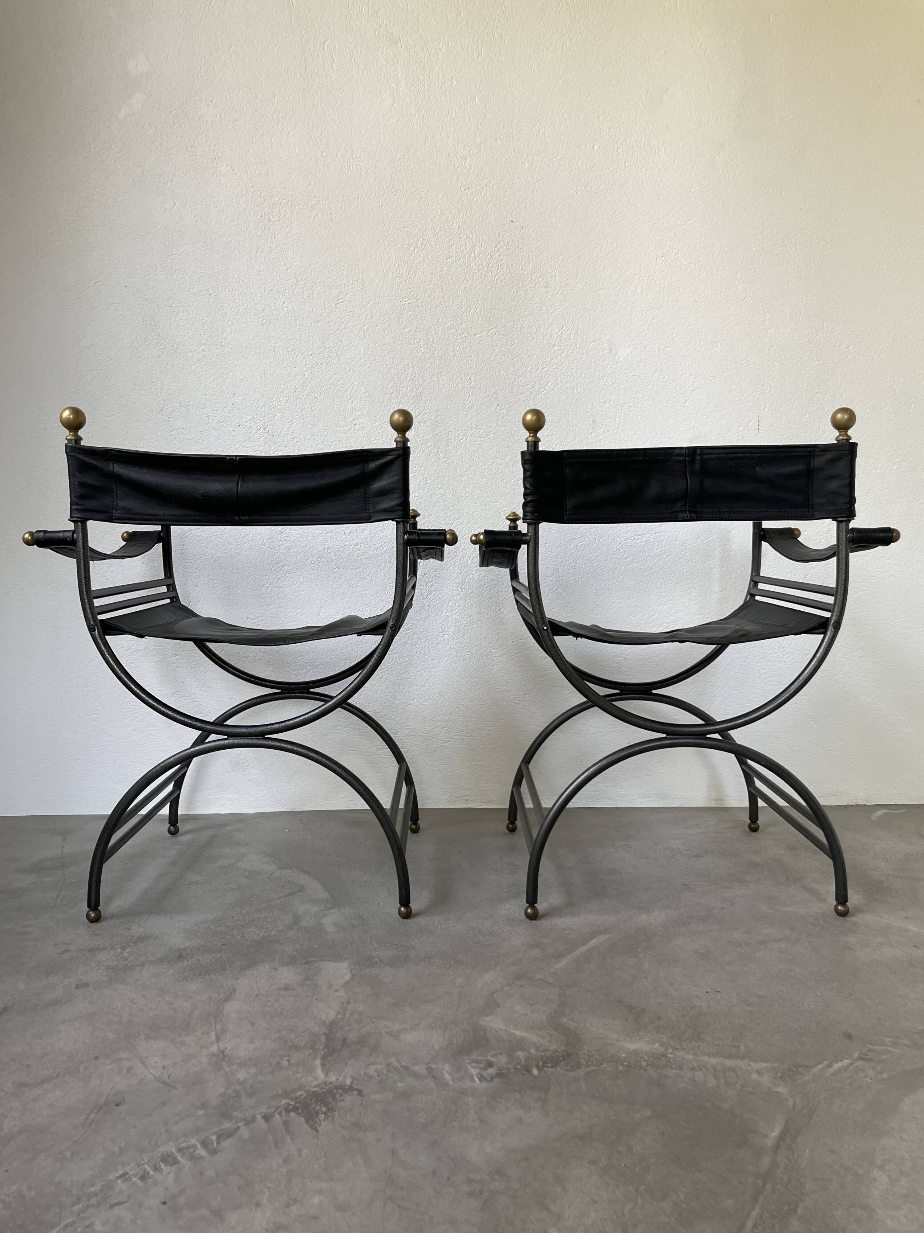 Pair of leather “curule” emperor armchairs