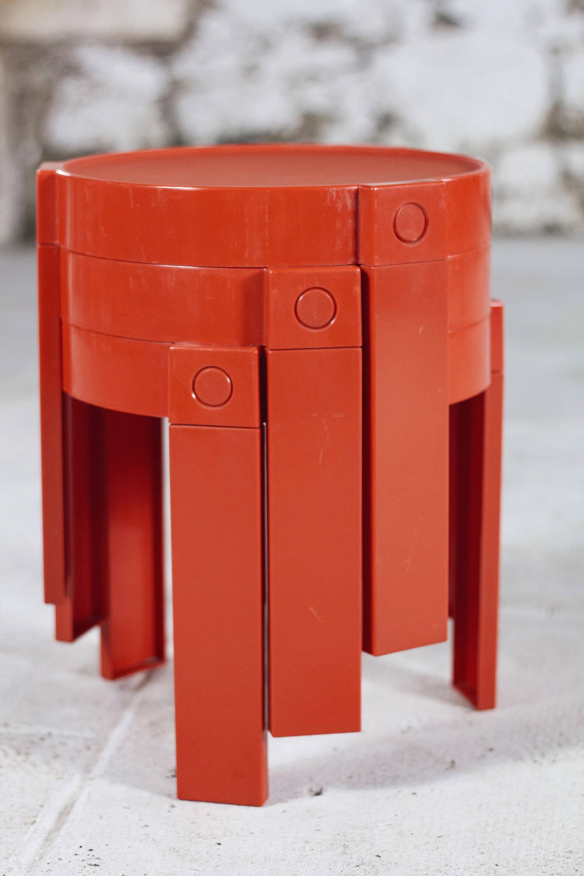 3 nesting tables in orange plastic by Prisunic, 1970.
