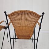 Pair of wicker and iron armchairs by Frederic Weinberg, United States, 1950s.