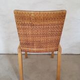 5 wooden and rattan chairs