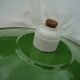 Old industrial suspension in green enamelled sheet metal and porcelain socket
