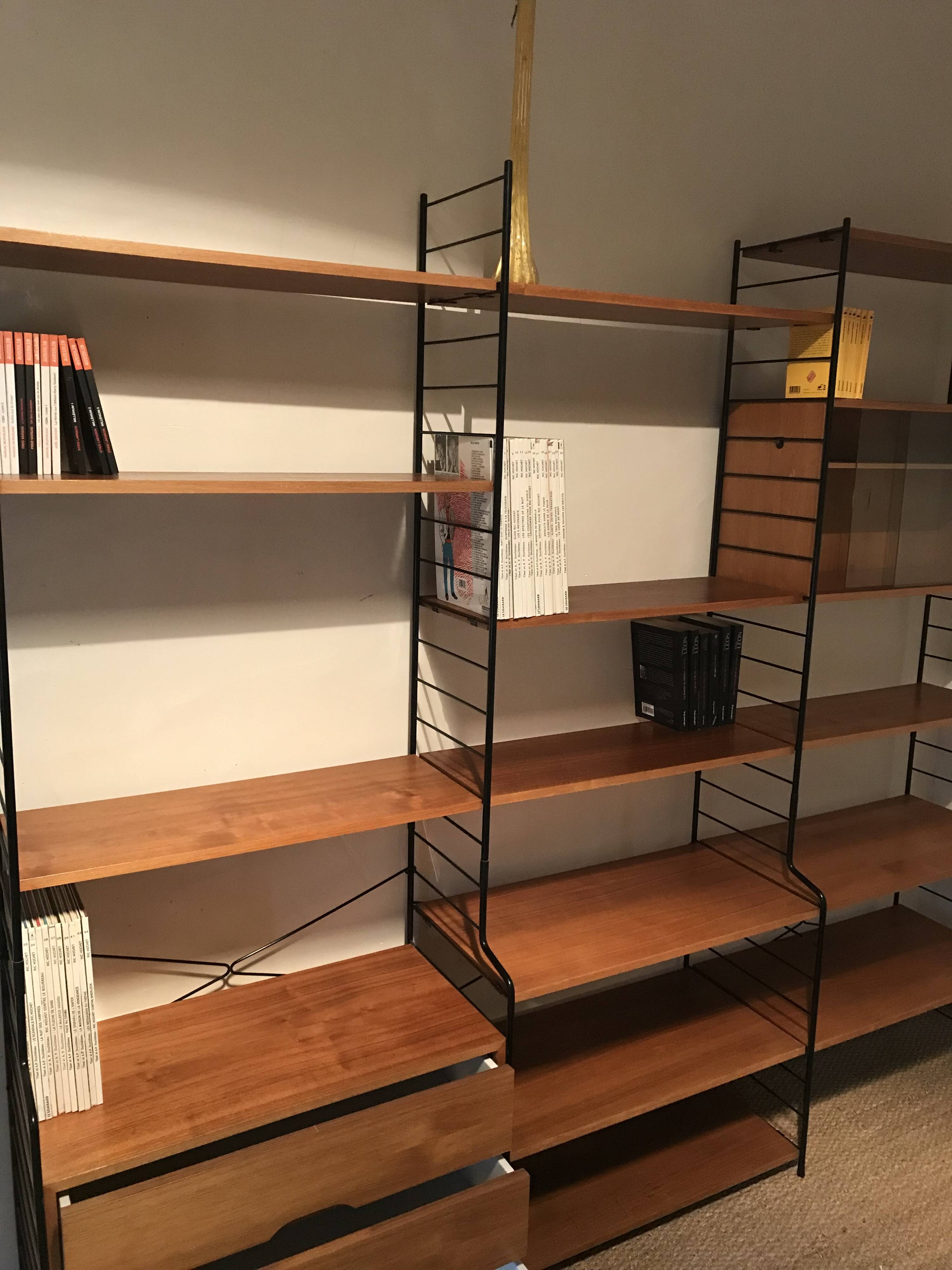 Vintage modular wall-mounted library shelf in blond walnut 1960-80