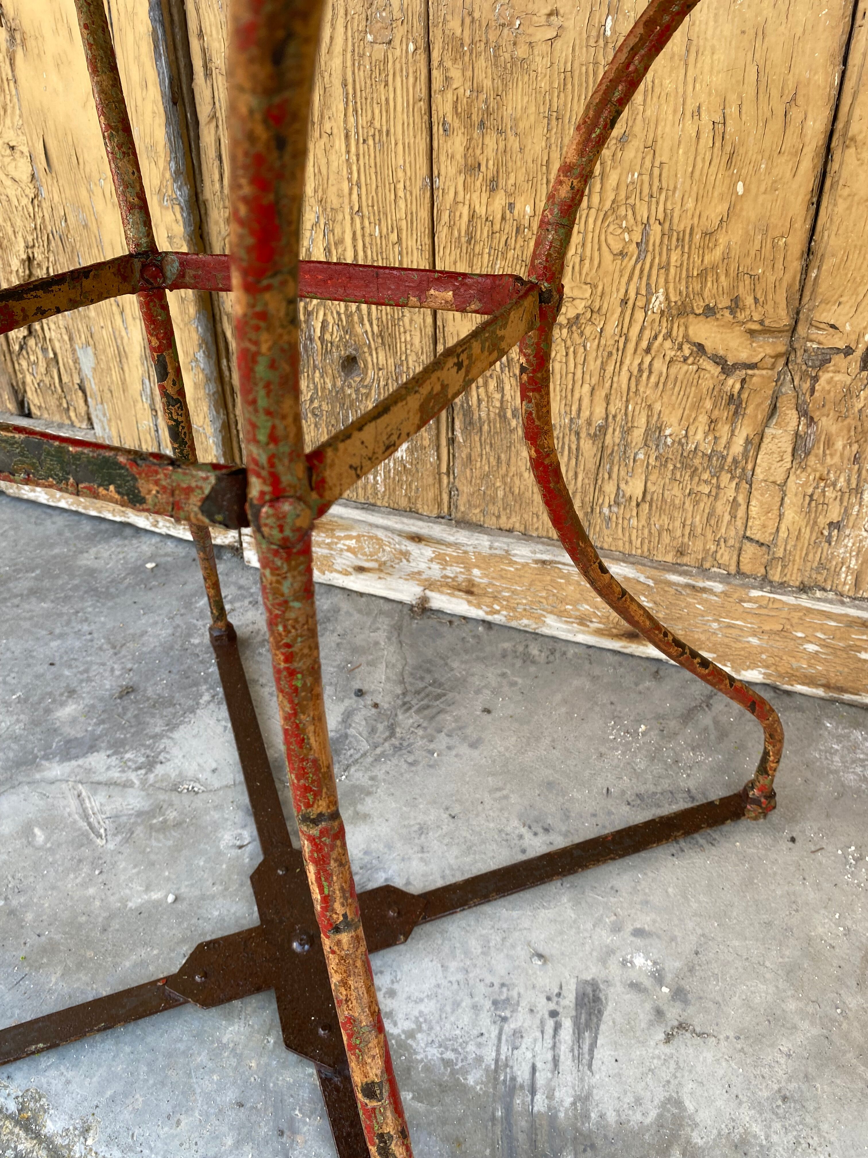 Wrought iron pedestal table