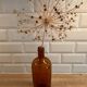 Amber glass bottle vase