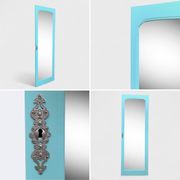 Beveled mirror on turquoise Parisian door