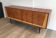 Designer sideboard with 4 doors in sapele mahogany and sycamore on a blackened wood base