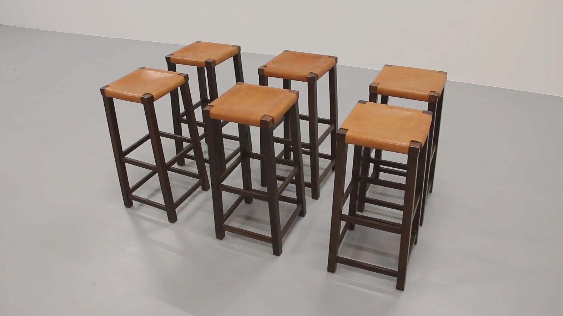 Mid-century oak bar stools with cognac leather seats