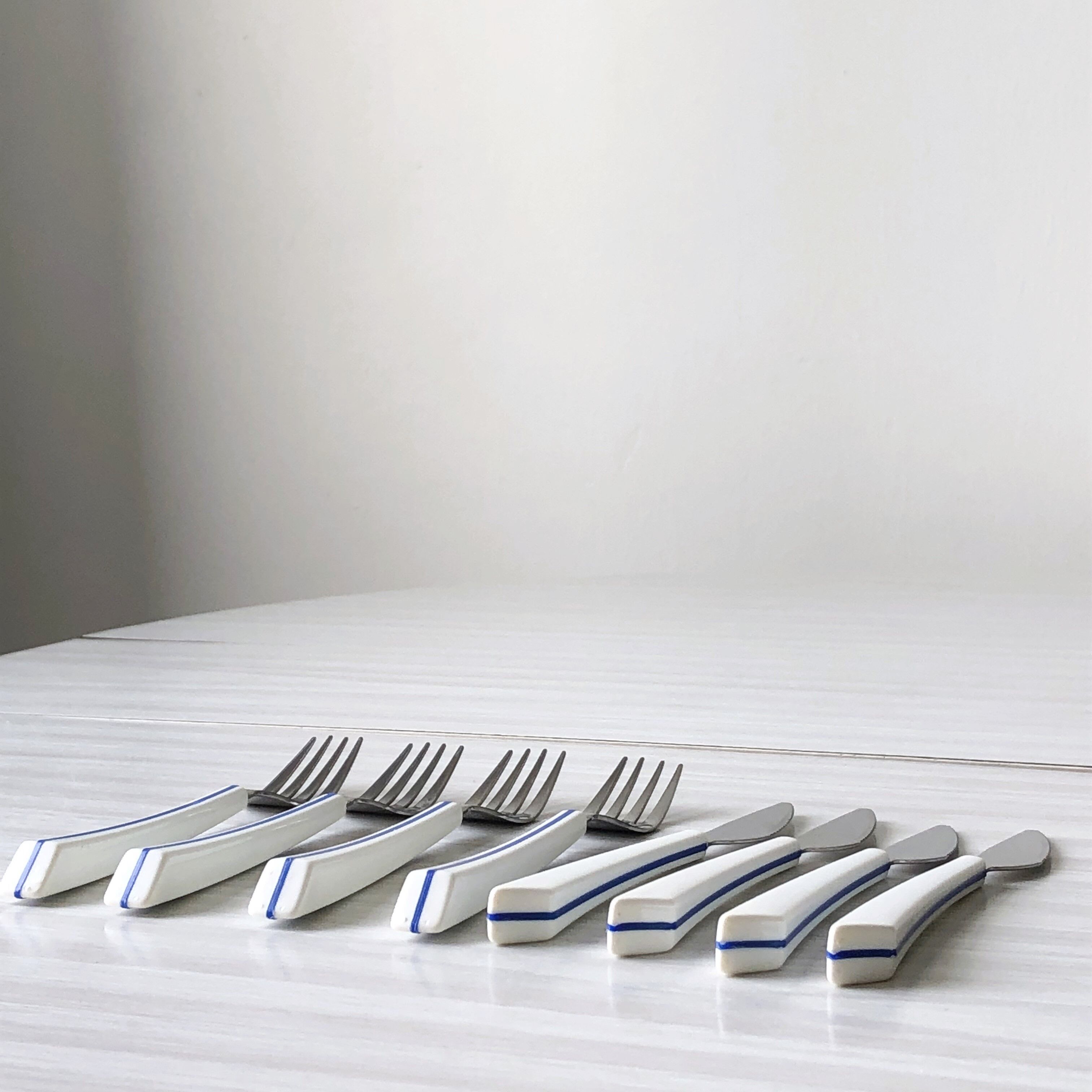Set of 4 forks and 4 knives Air France of the 70s by Nathalie George
