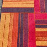 Persian tufted wool rug with geometric stripes in burgundy and brown 140x80