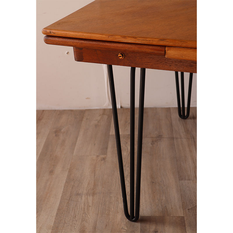 Vintage extendable dining table in wood and metal base, 1950