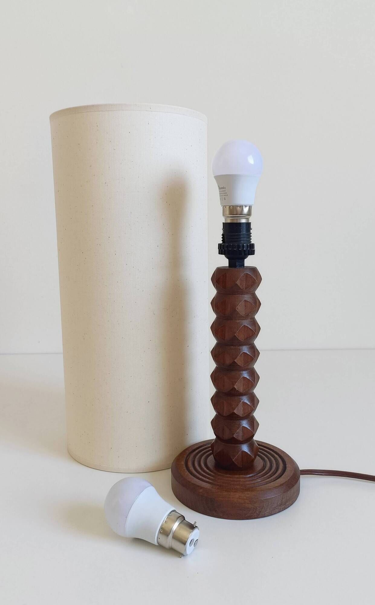 Art Deco wooden table lamp by Charles Dudouyt, France, circa 1930s.