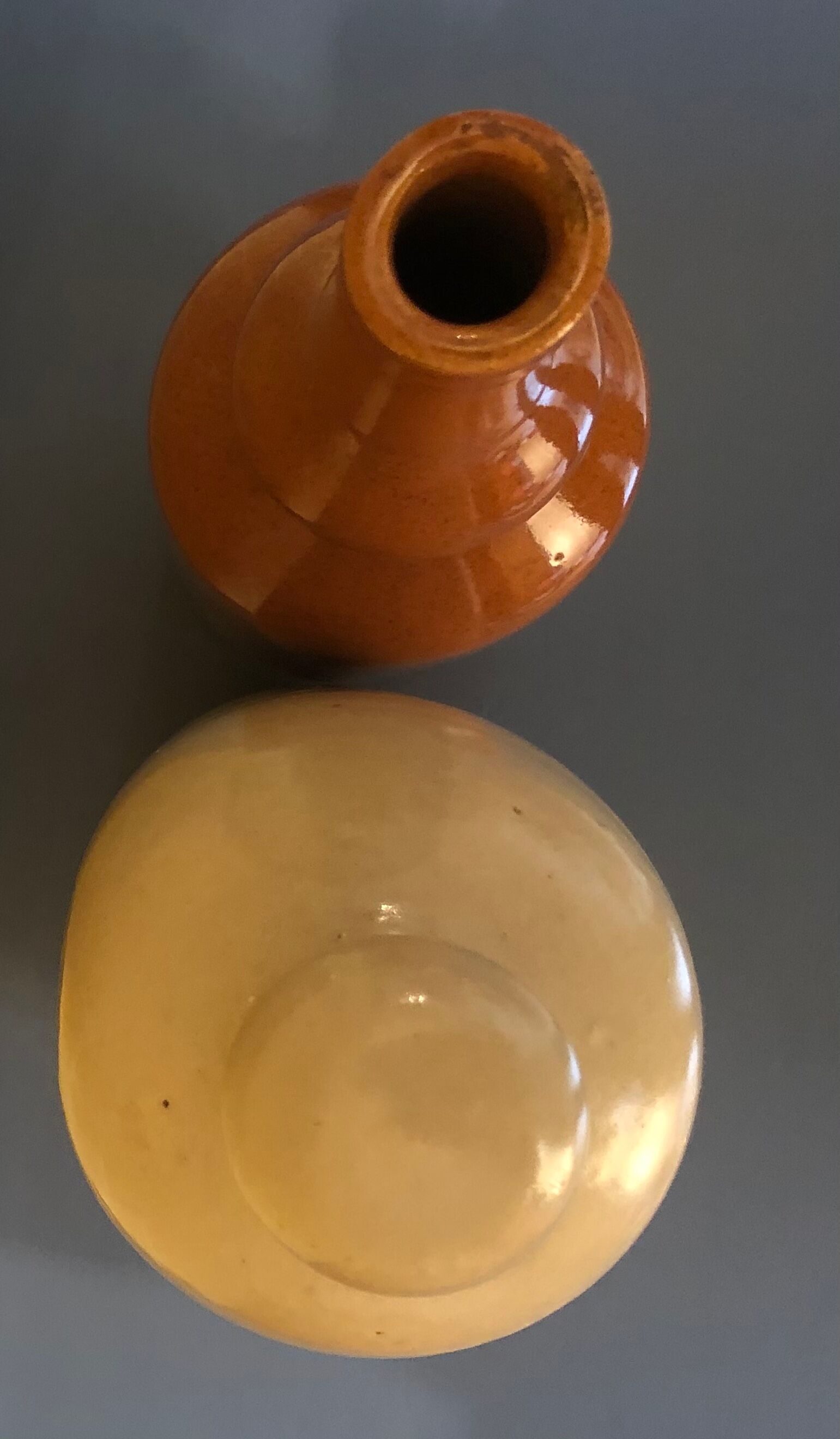 Duo of sandstone bottles
