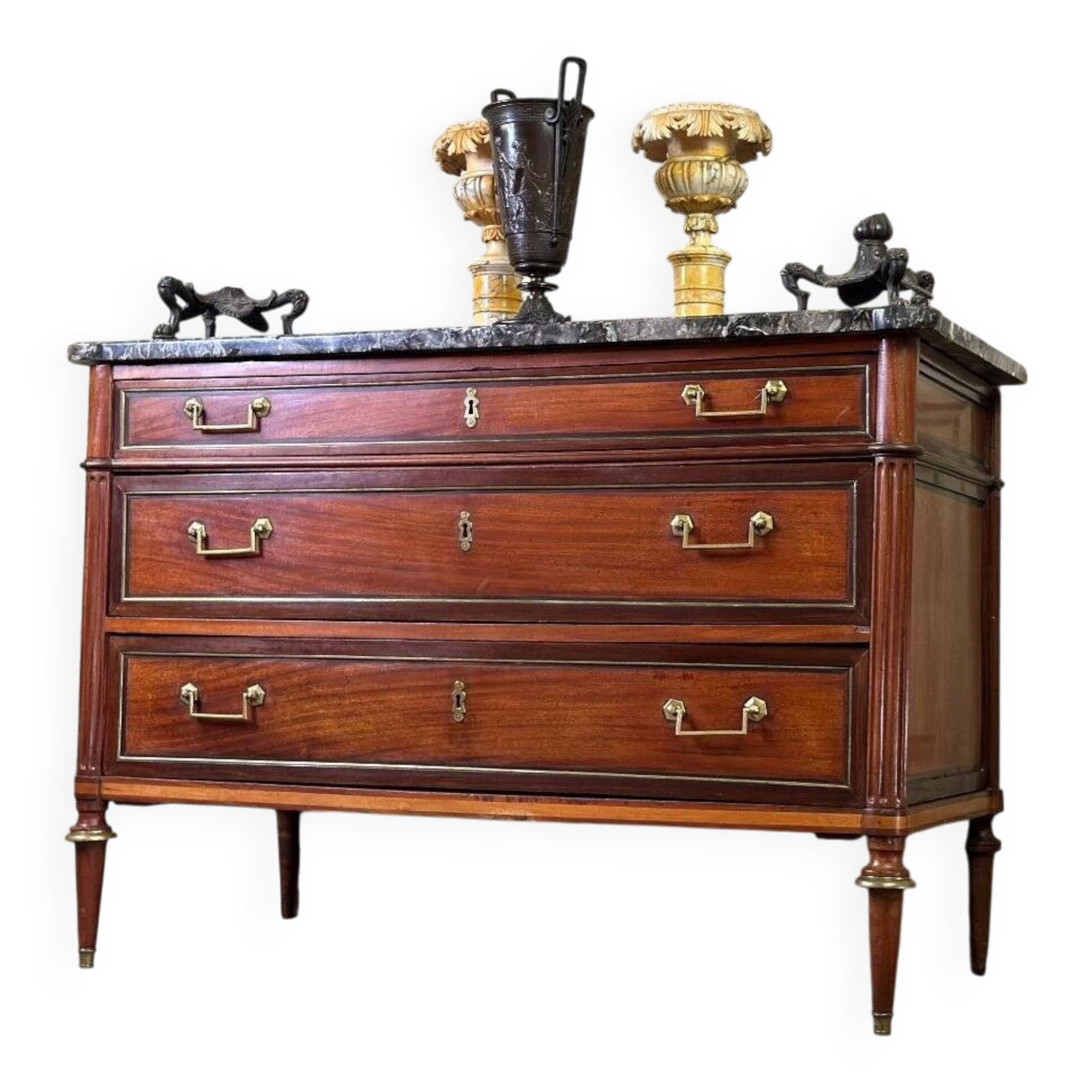 Louis XVI style mahogany commode in three colors, 18th century